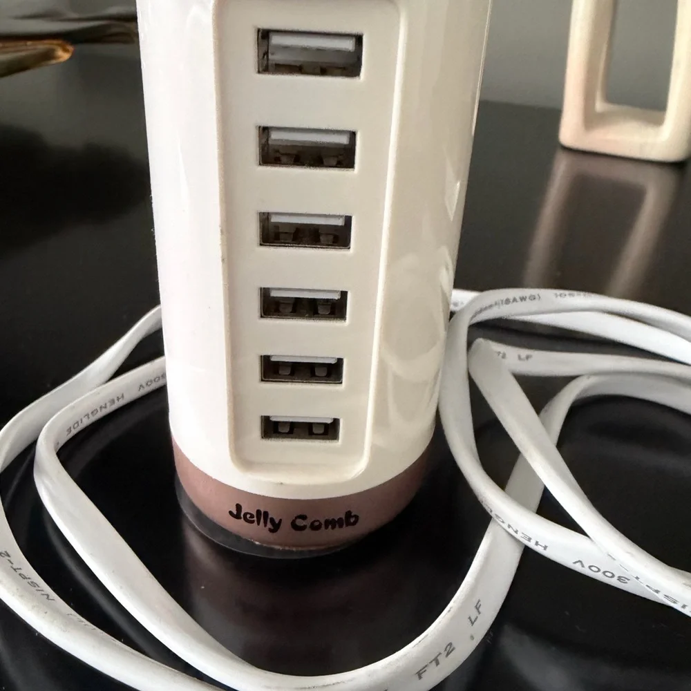 White and Gold USB Charger Tower. Works perfect and in excellent condition.